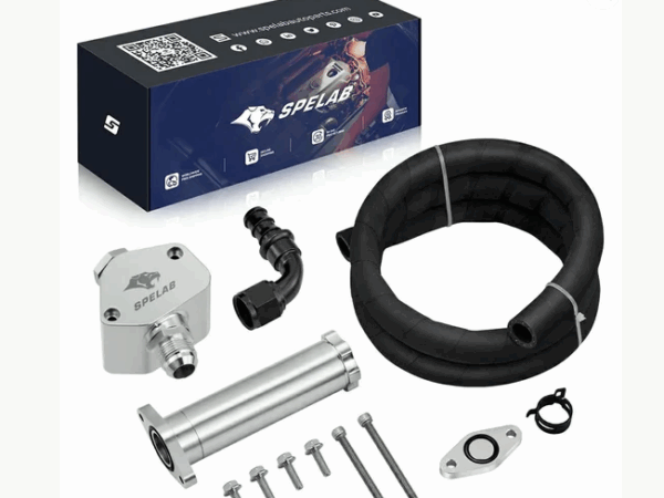 Components of a car exhaust system kit laid out with packaging box.