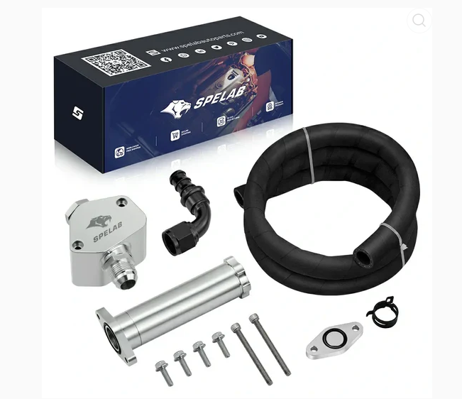Components of a car exhaust system kit laid out with packaging box.