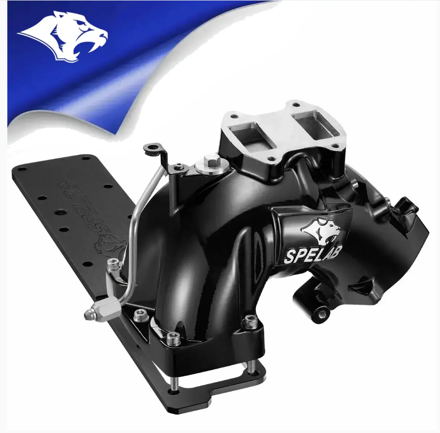 Black automotive intake manifold with a blue and white background.