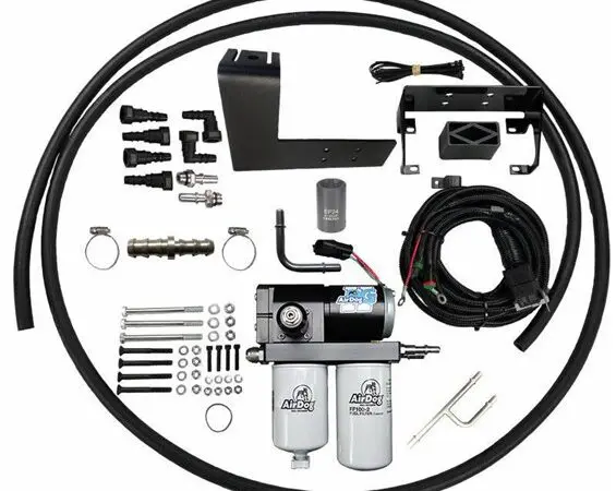Air suspension compressor kit components laid out.