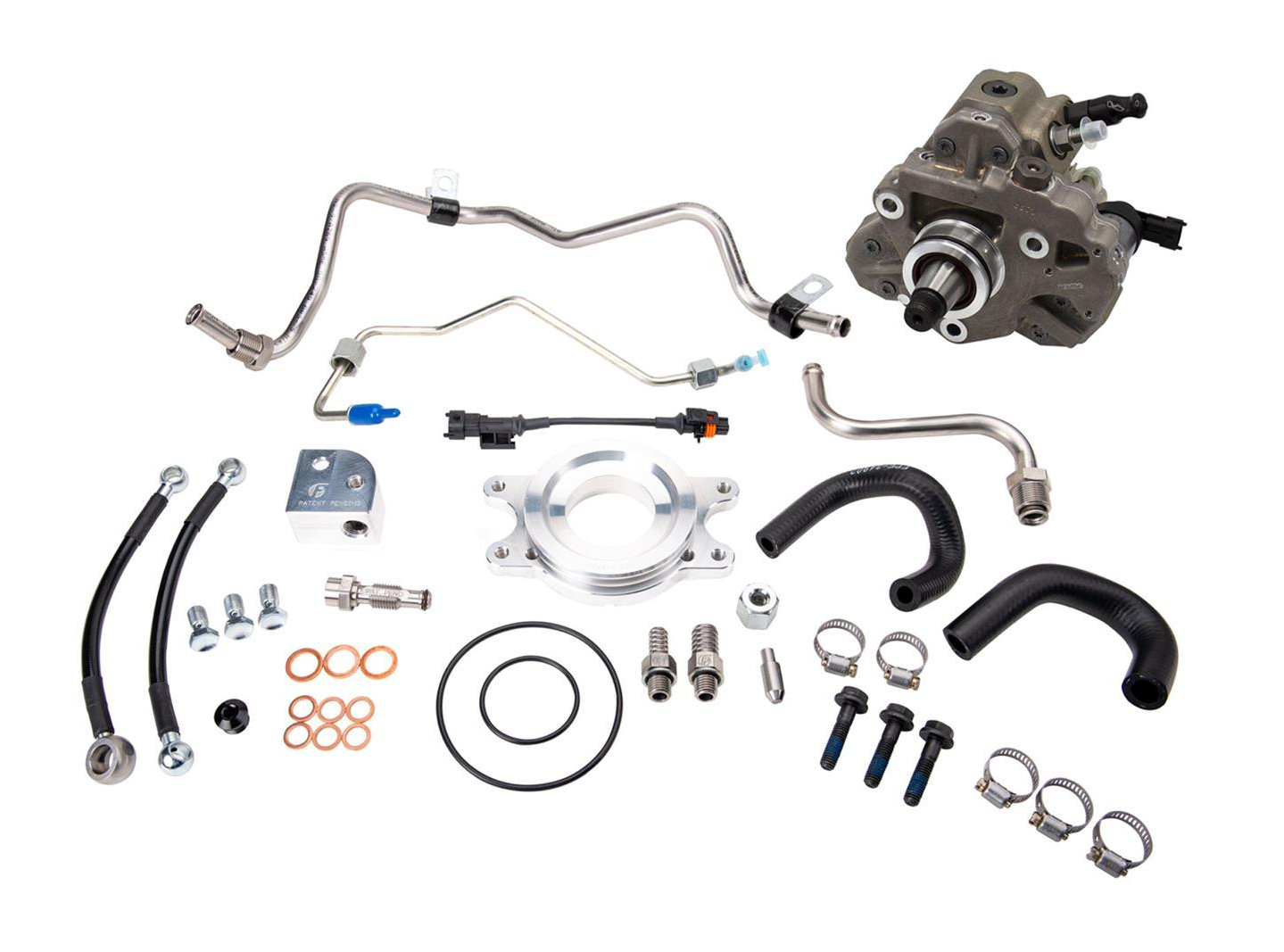 A collection of automotive parts including pipes, bolts, and a pump.