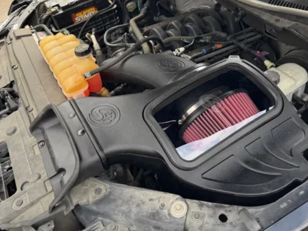 Car engine with performance air intake system.