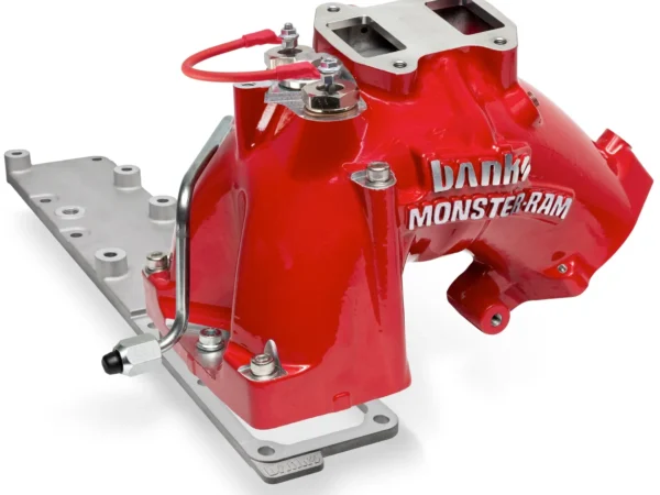 Red engine manifold with metallic components.