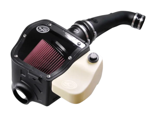 Cold air intake system on black background.